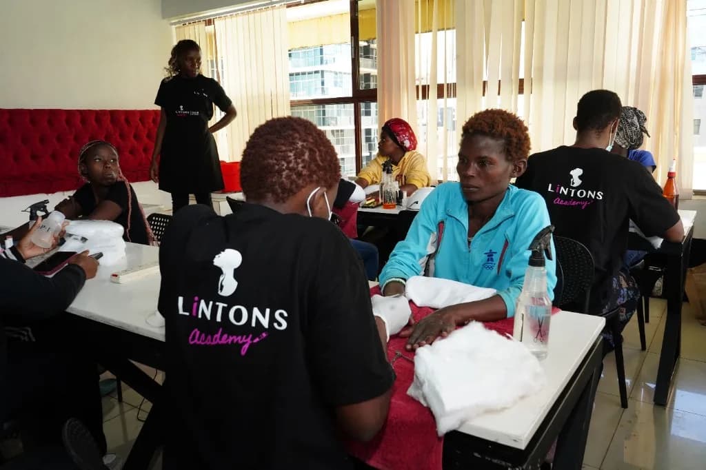 A Lintons Academy student delivering nail care at a Dignity Day